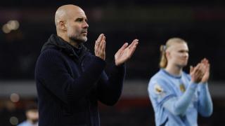 Pep Guardiola, tras un partido del Manchester City con Haaland de fondo
