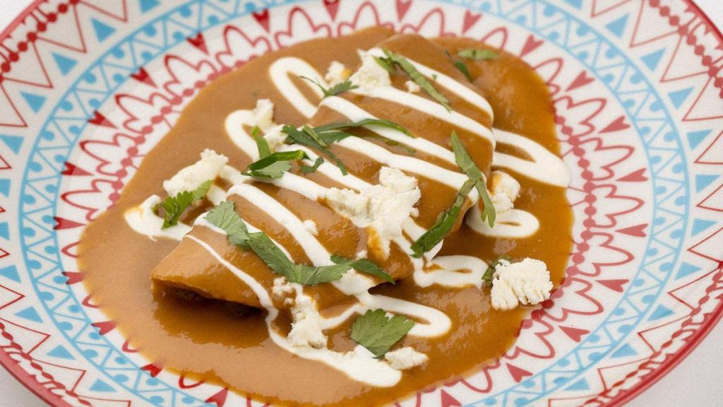 Enchiladas de lengua gallega y queso del Cebreiro (El Cártel de Mawey).
