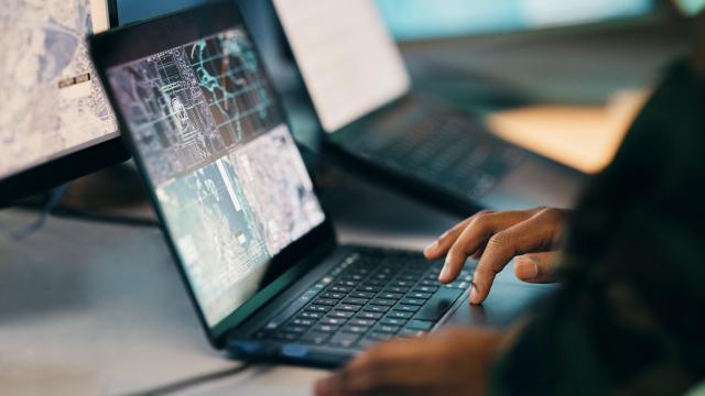 hands-typing-laptop-and-closeup-on-table-of-milit-2023-11-27-05-00-23-utc