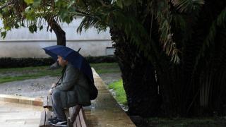 Vecinos con paraguas durante las últimas lluvias en Málaga.