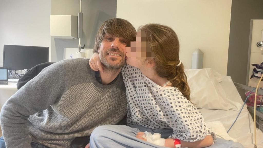 José María Prado con Lucía, su hija.