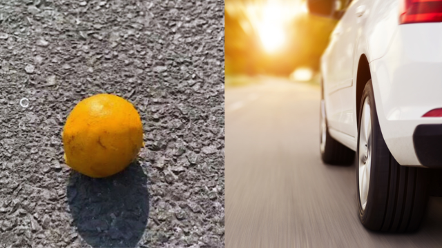 Una naranja en la carretera.