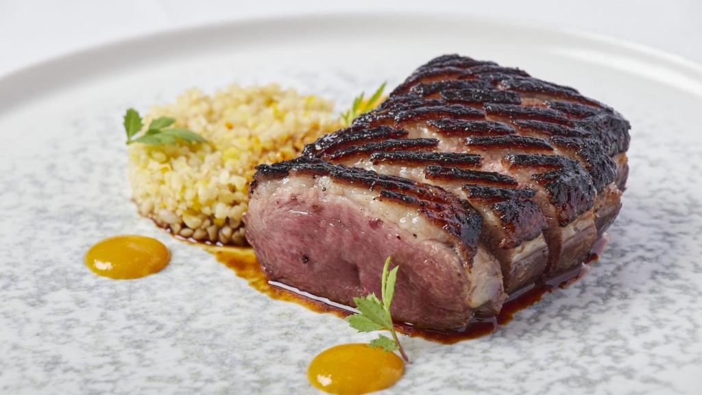 Magret de pato en agridulce de naranja.