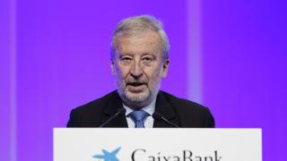 El presidente de CaixaBank, Tomás Muniesa, en la Junta General de Accionistas de este viernes. Ana Escobar / Efe