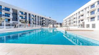 Imagen aérea de cómo será la promoción Alhora de AEDAS Homes en el nuevo barrio de Nou Nazareth en Sant Joan d'Alacant.