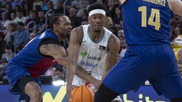 Kameron Taylor, con el balón frente a Hernangómez y Kevin Punter.