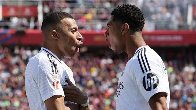 Mbappé y Bellingham celebran un gol.