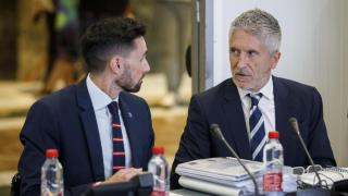 Rafael Pérez y Fernando Grande-Marlaska en una reunión del Centro de Coordinación Operativo (CECOR), en octubre de 2023.