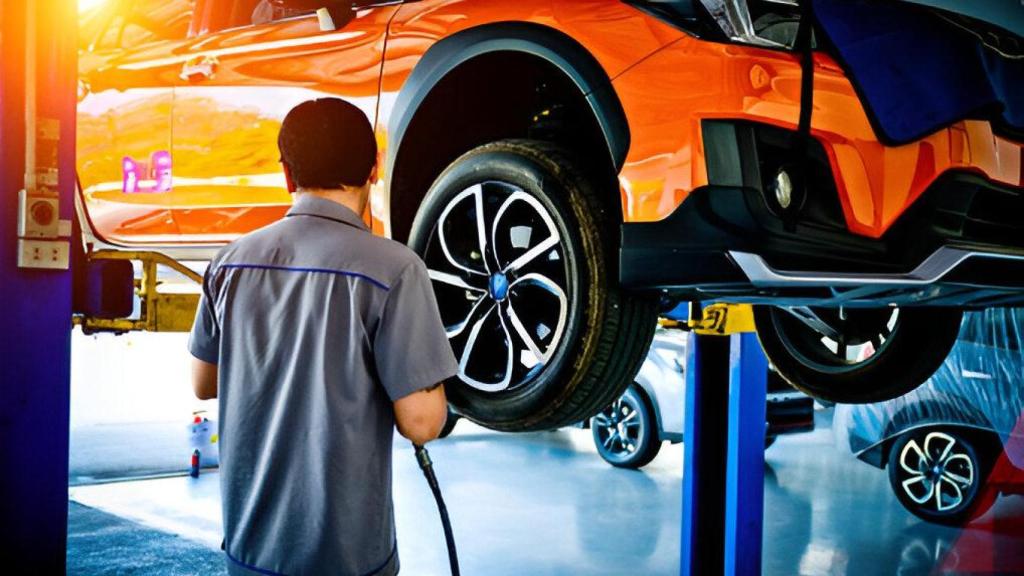 Vehículo siendo arreglado en un taller.