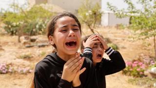Niños reaccionan a la incursión israelí en Tammoun, cerca de Tubas, en Cisjordania.