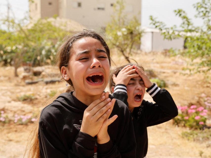 Niños reaccionan a la incursión israelí en Tammoun, cerca de Tubas, en Cisjordania.