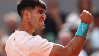 Alcaraz celebra un punto contra Shelton.