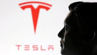 FILE PHOTO: A 3D-printed miniature model of Elon Musk and the Tesla logo are seen in this illustration taken January 23, 2025. REUTERS/Dado Ruvic/Illustration/File Photo