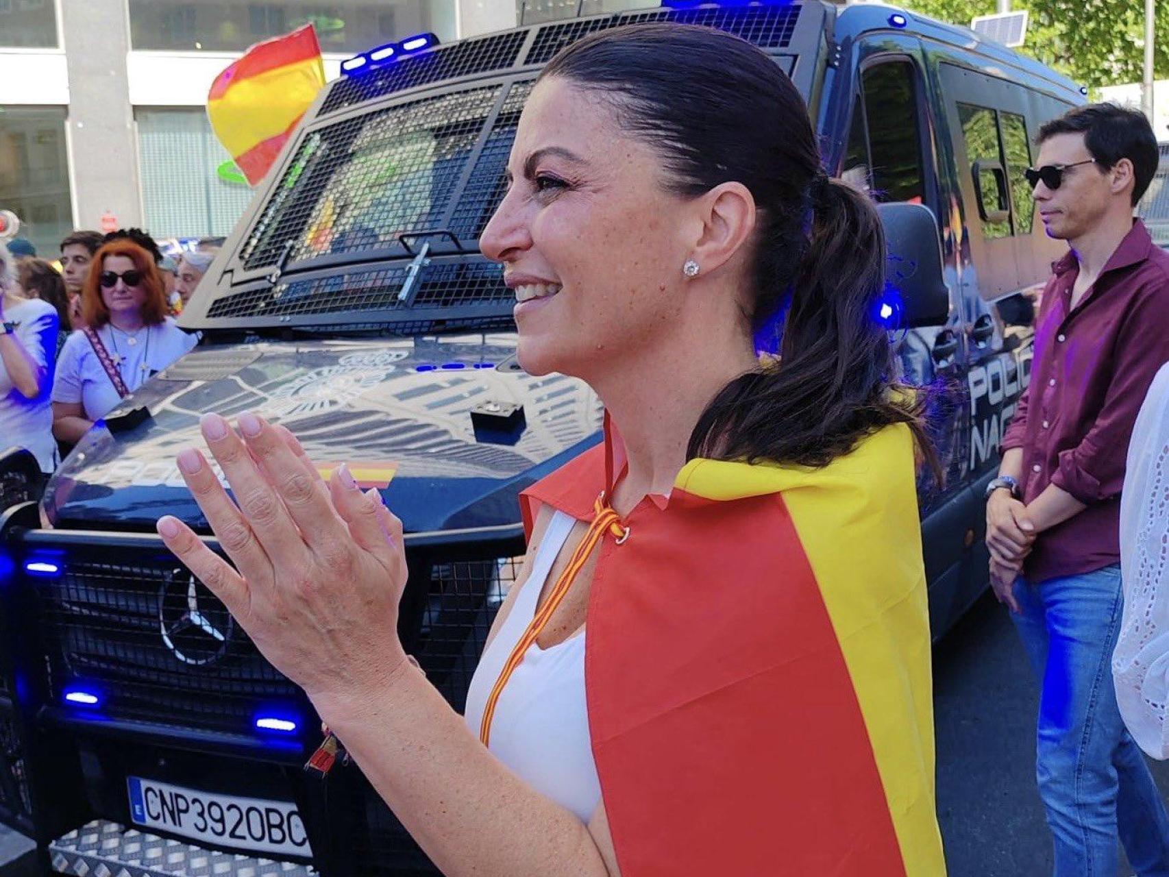 La exdiputada de Vox Macarena Olona, este domingo en la manifestación de la plaza de España de Madrid.