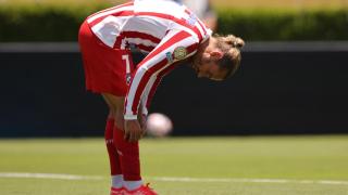 Griezmann, resignado por la imagen del equipo en la primera parte.