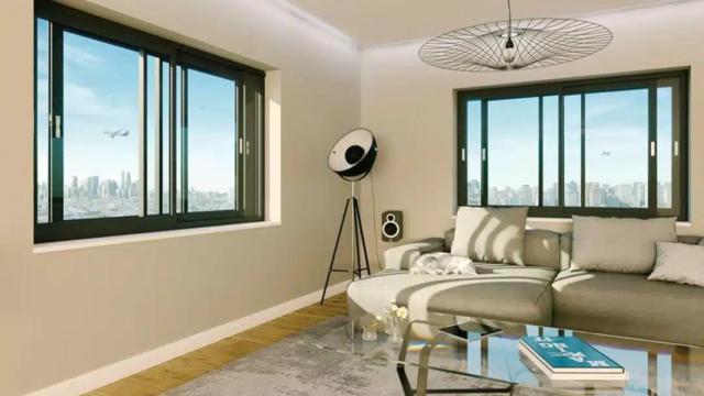 Un salón con las ventanas climáticas de Technal.