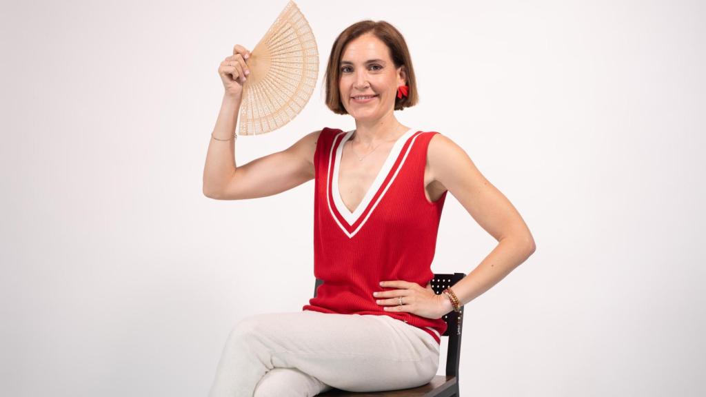 Boticaria García posando en un evento.