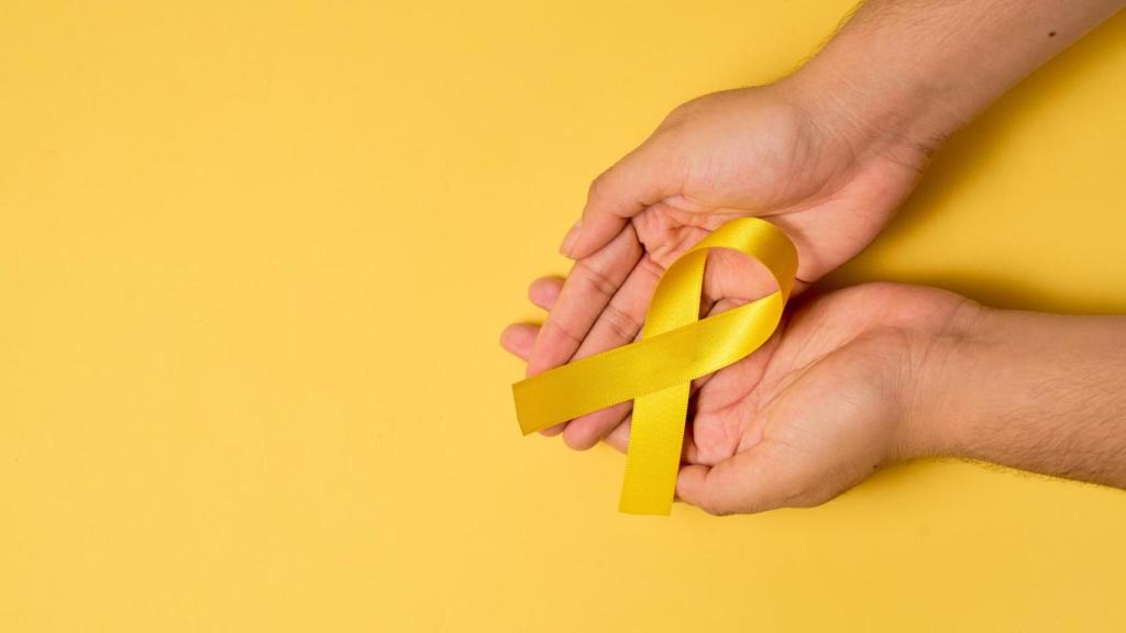 Lazo amarillo símbolo contra el cáncer sarcoma