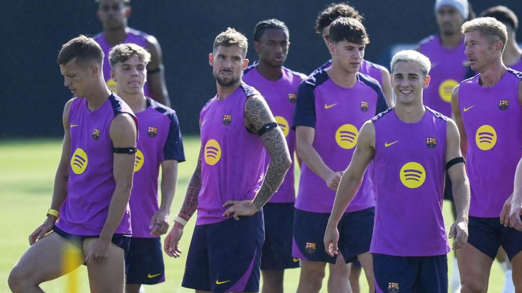 Los jugadores del Barça durante un entrenamiento.