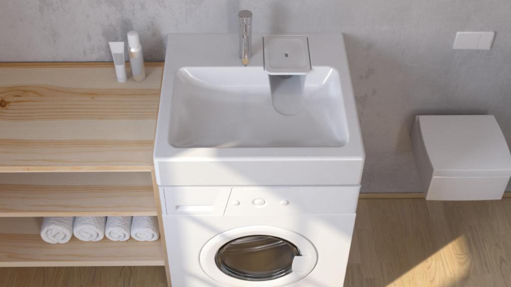 El lavabo Compactino WBX 101 encima de una lavadora.