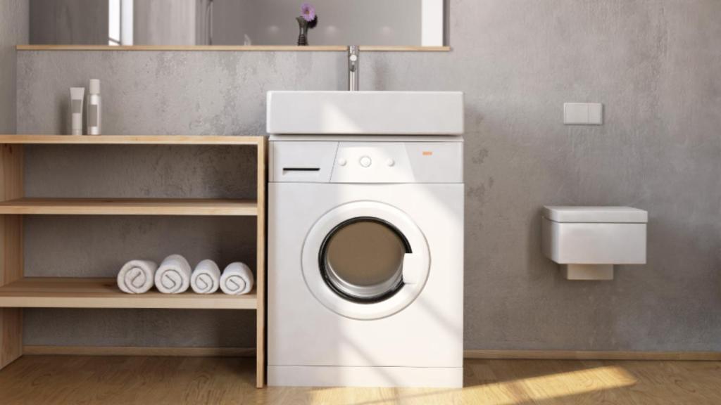 El lavabo Compactino WBX 101 encima de una lavadora.