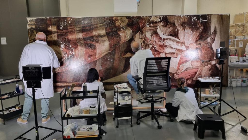 Trabajos de restauración en el panel 'Los borrachos'. Foto: Banco Santander