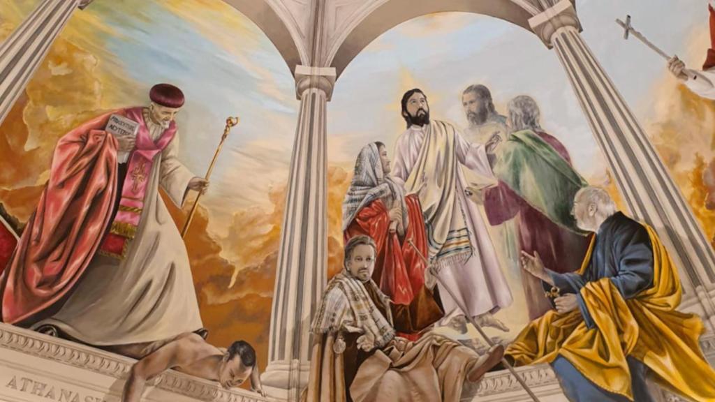 El fresco de la iglesia del Santísimo Cristo donde aparece el padre Montes (en el centro, sentado) caracterizado como Santiago Apóstol.