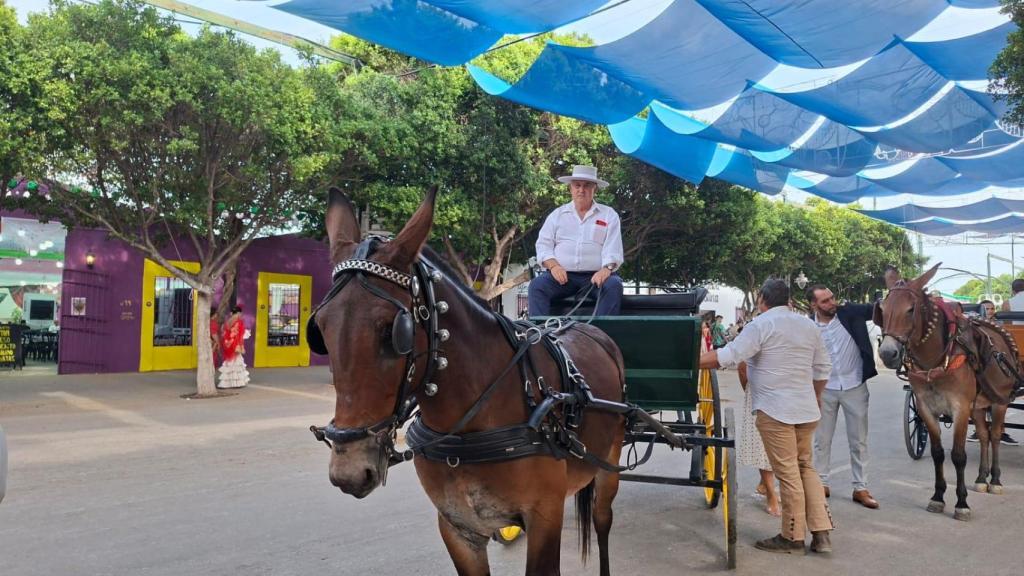 Diego junto a su caballo en la Feria de Málaga.