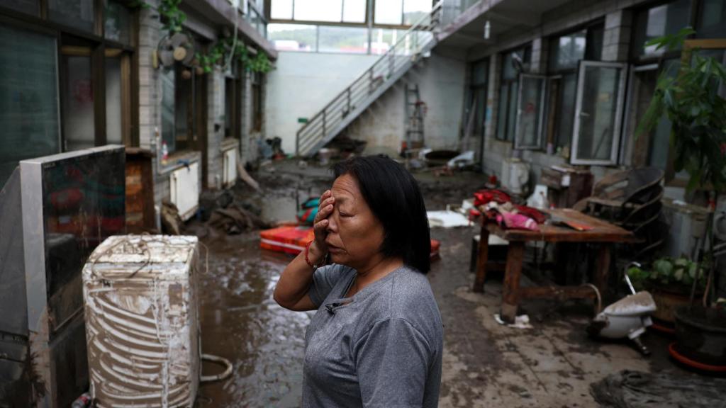 Consecuencias de las fuertes lluvias de finales de julio que inundaron pueblos en Huairou, Beijing.