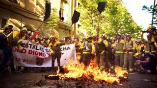 Concentración de los bomberos forestales de la Comunidad de Madrid el pasado mes de julio durante la huelga convocada.