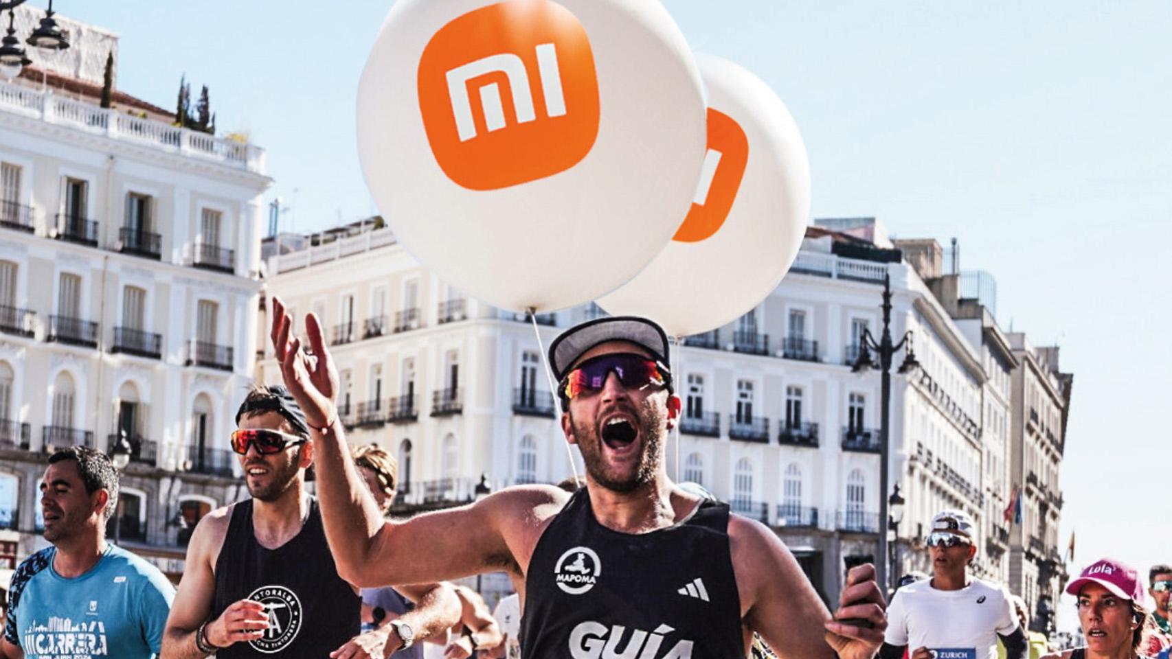 Cartel promocional de la carrera de Xiaomi.