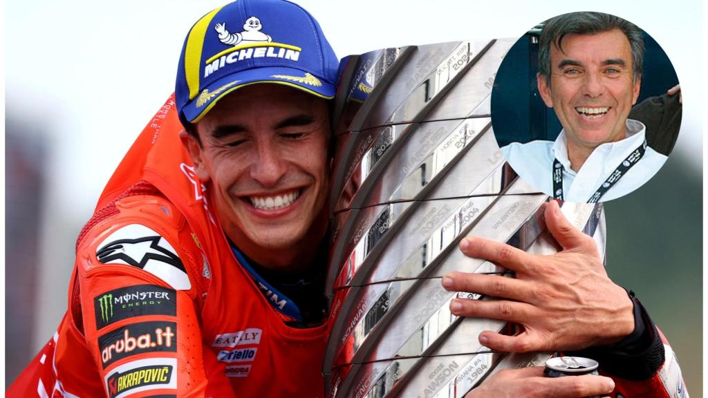 Marc Márquez abraza la 'Torre de Campeones' tras ganar el Mundial de MotoGP.