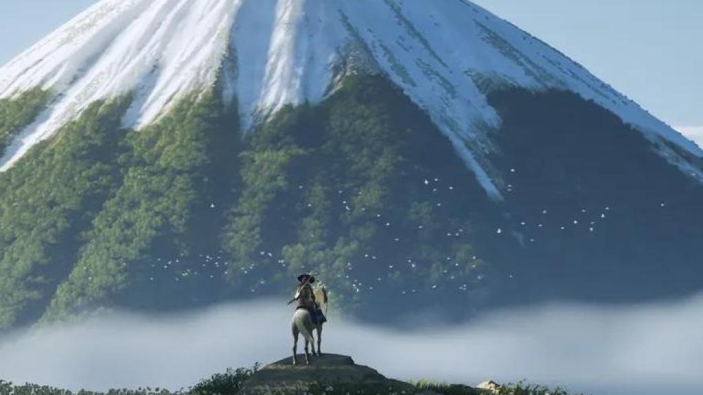 Imagen de Ghost of Yotei, con la protagonista observando el monte que da nombre al juego.