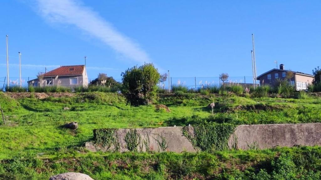 Viviendas unifamiliares de Monte Mero vistas desde Xuxán.