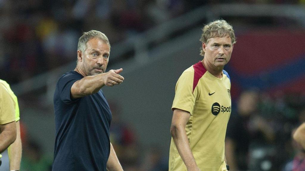 Marcus Sorg, junto a Flick.