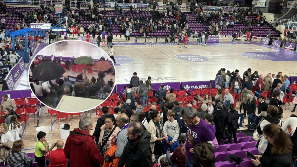 Imágenes del partido tras la suspensión y los aficionados con paraguas