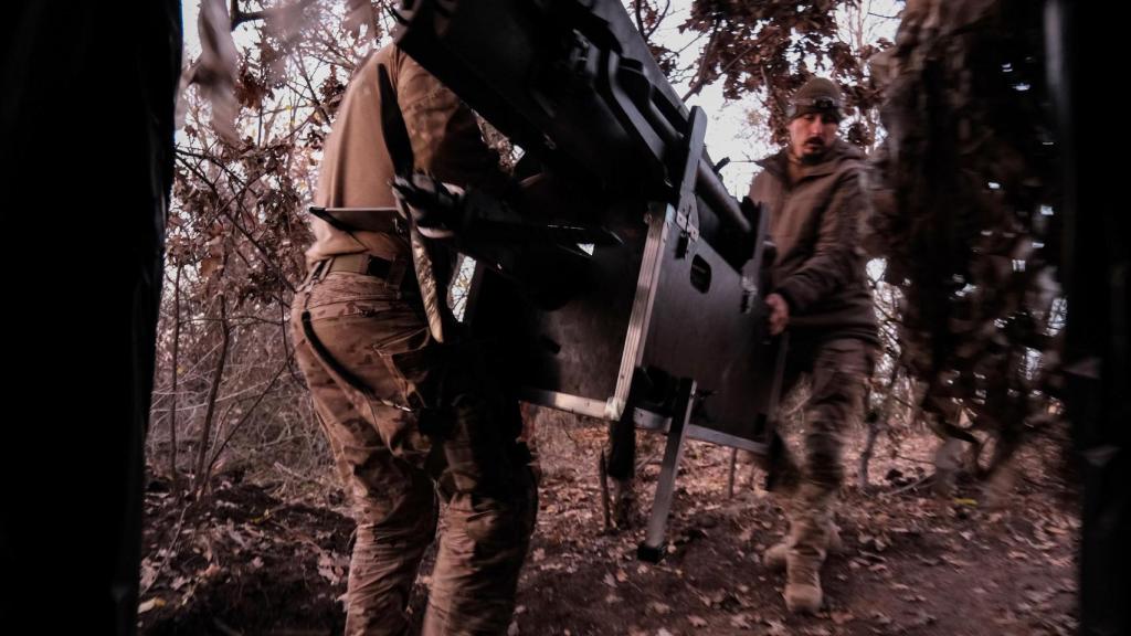 Ukrainian troops from an unmanned vehicle unit prepare a GARA bomber drone for an attack mission on the Pokrovsk front.