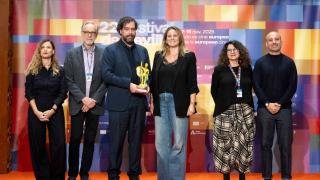 Imagen de Angie Moreno con los premiados.