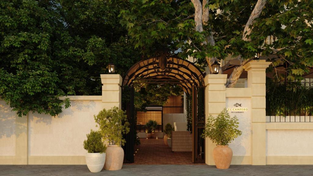 La entrada al palacio donde se ubica El Campero Madrid.