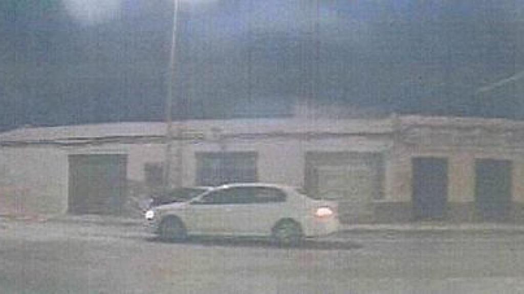 O carro em que os ladrões viajavam.