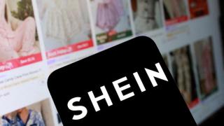 Imagen de la página web de Shein y su logo.