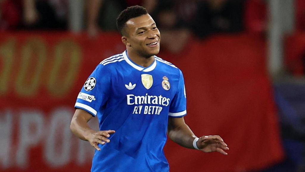 Mbappe celebrates one of his goals against Olympiacos.