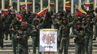 Members of the Bolivarian National Armed Forces (FANB) of Venezuela take part in a convoy in September, in Caracas (Venezuela).