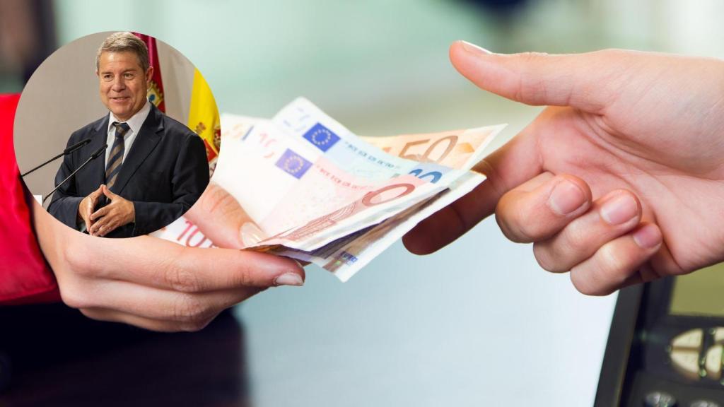 Emiliano García-Page con una imagen de dinero de fondo.