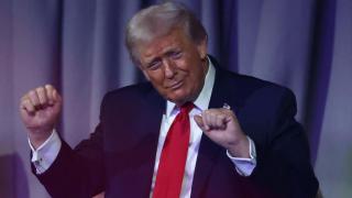 Donald Trump dances while the Village People perform during the 2026 FIFA World Cup draw.