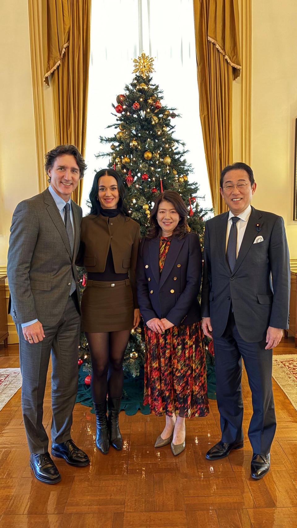 Justin Trudeau and Kary Perry, with former Japanese president Fumio Kishida, and his wife, Yuko.