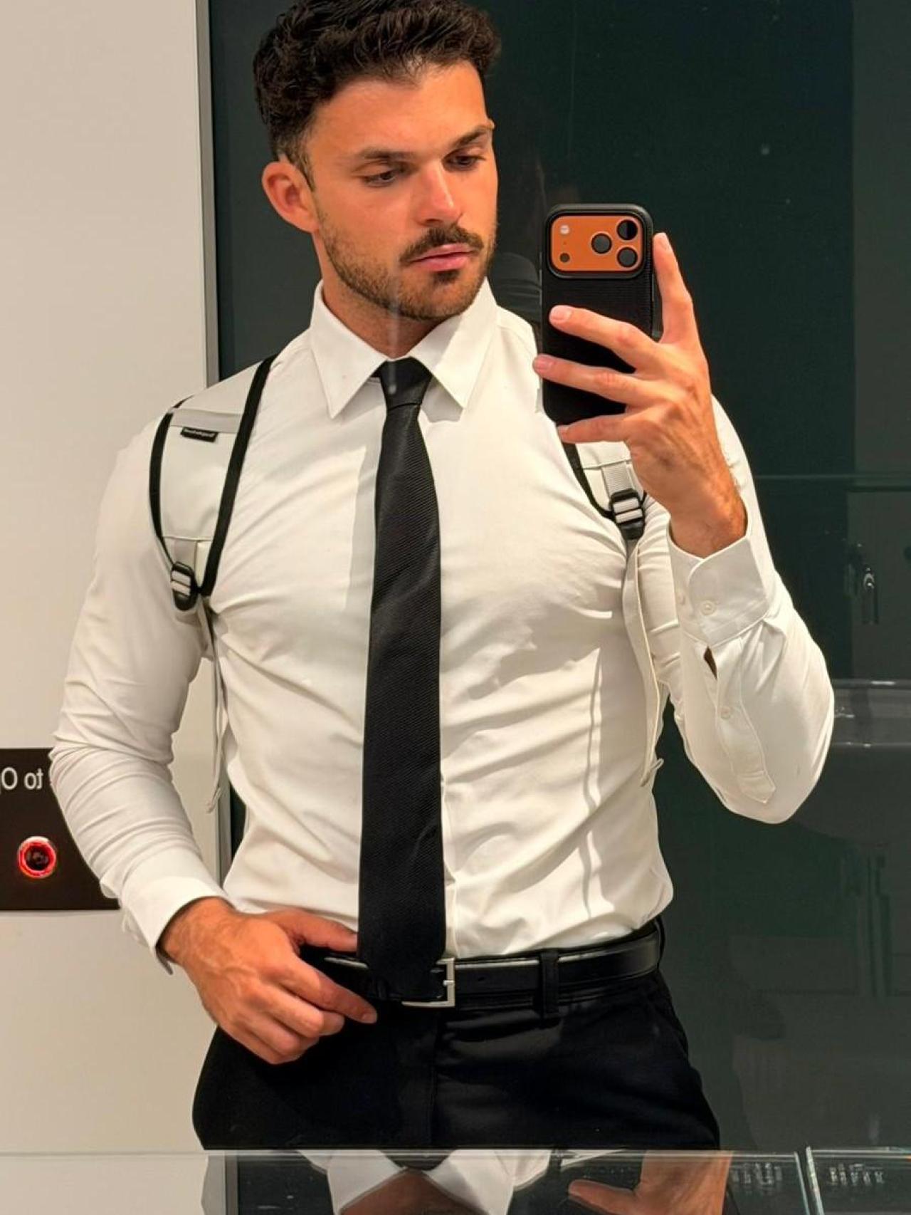 Sergio, in his waiter costume in the restaurant in front of the Sydney Opera House.