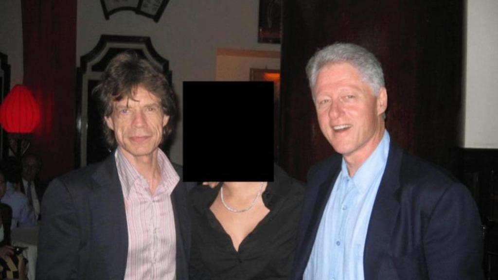Jagger and Clinton with a wife.