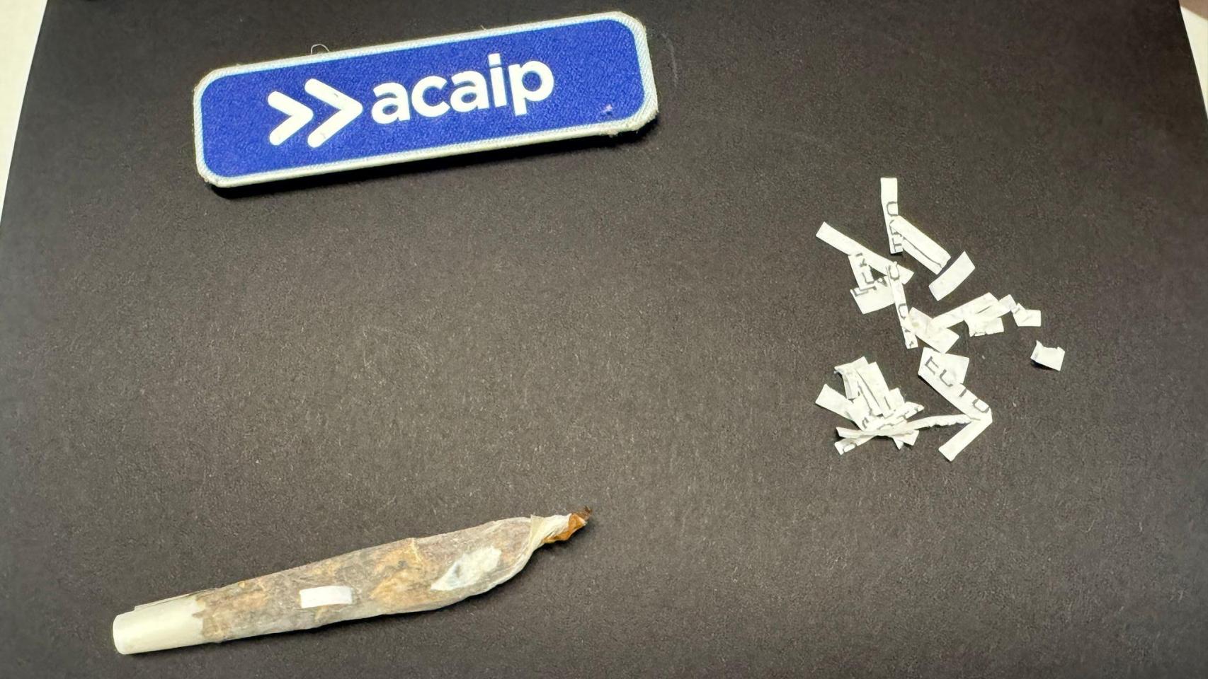 Imagen de un decomiso de 'papelito' con distintas dosis cortadas y una de ellas, introducida en un cigarro, lista para el consumo.