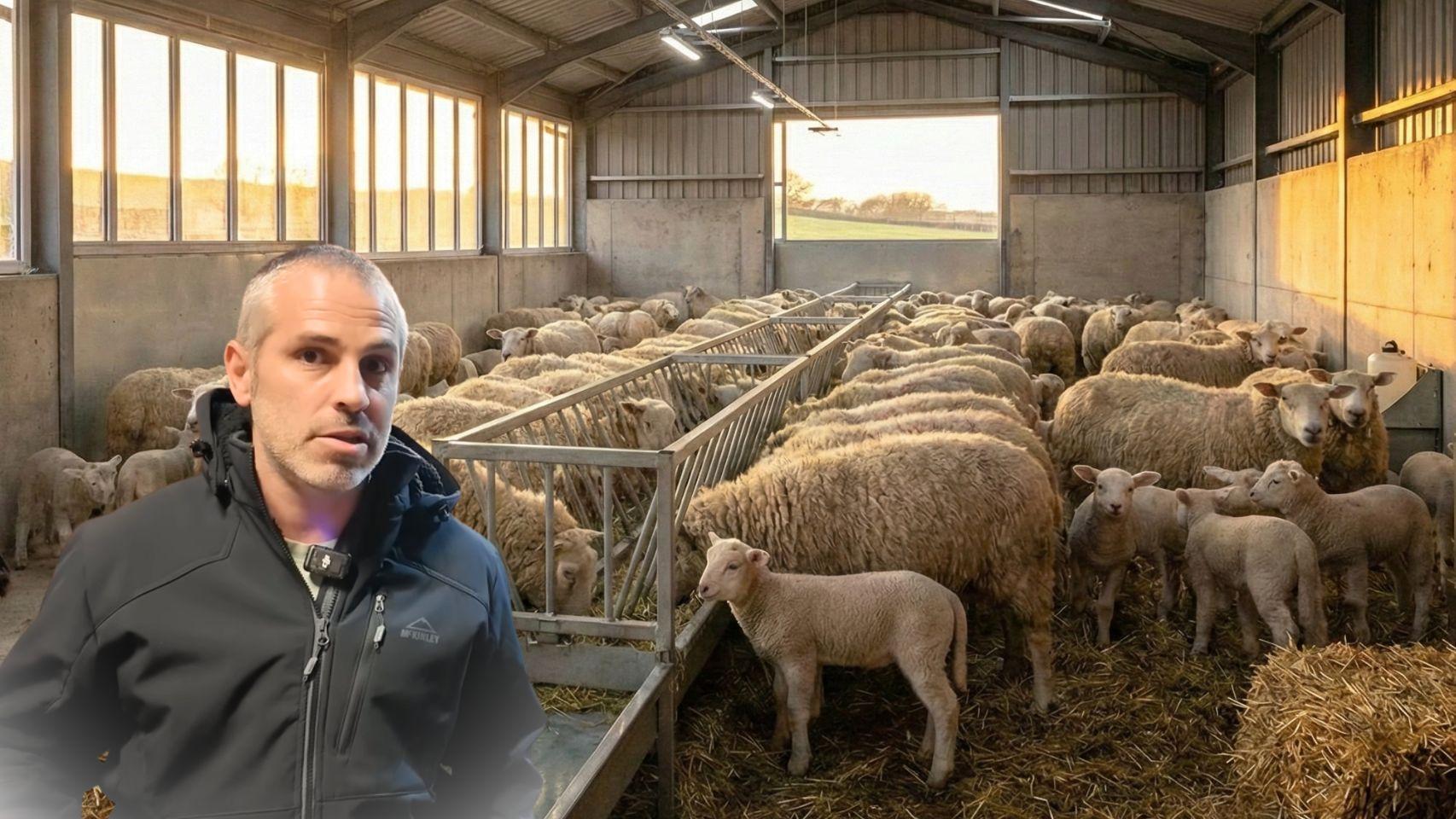 Imanol, pastor navarro con un establo de ovejas de fondo